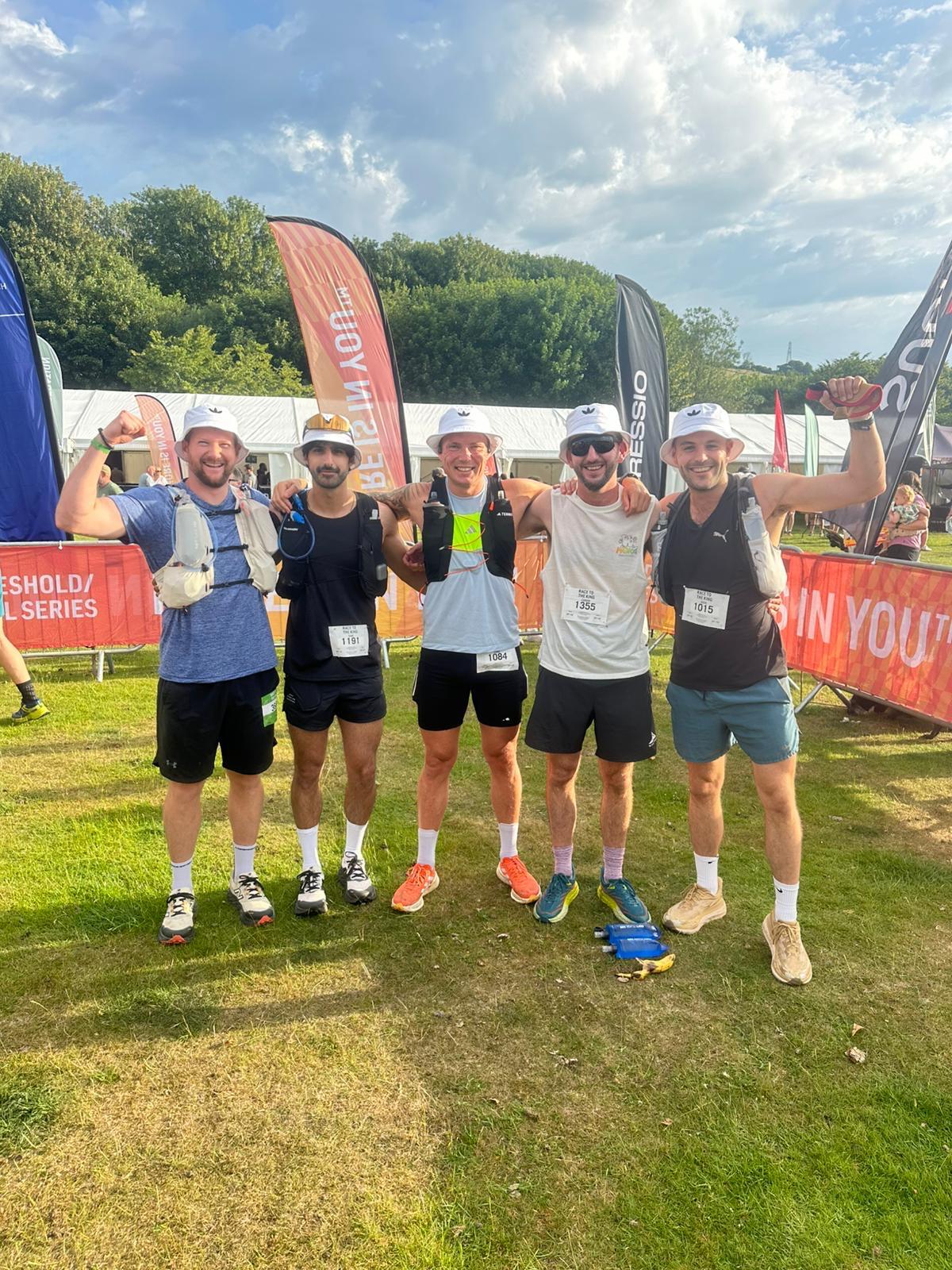 Tri Project members celebrating at a race finish